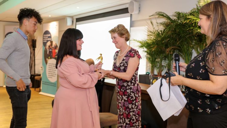 Outstanding Volunteer Award presented to Wayne Jordan's daughter Kerrie.