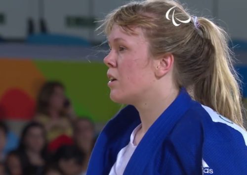 Natalie while competing in Rio mid match looking flushed