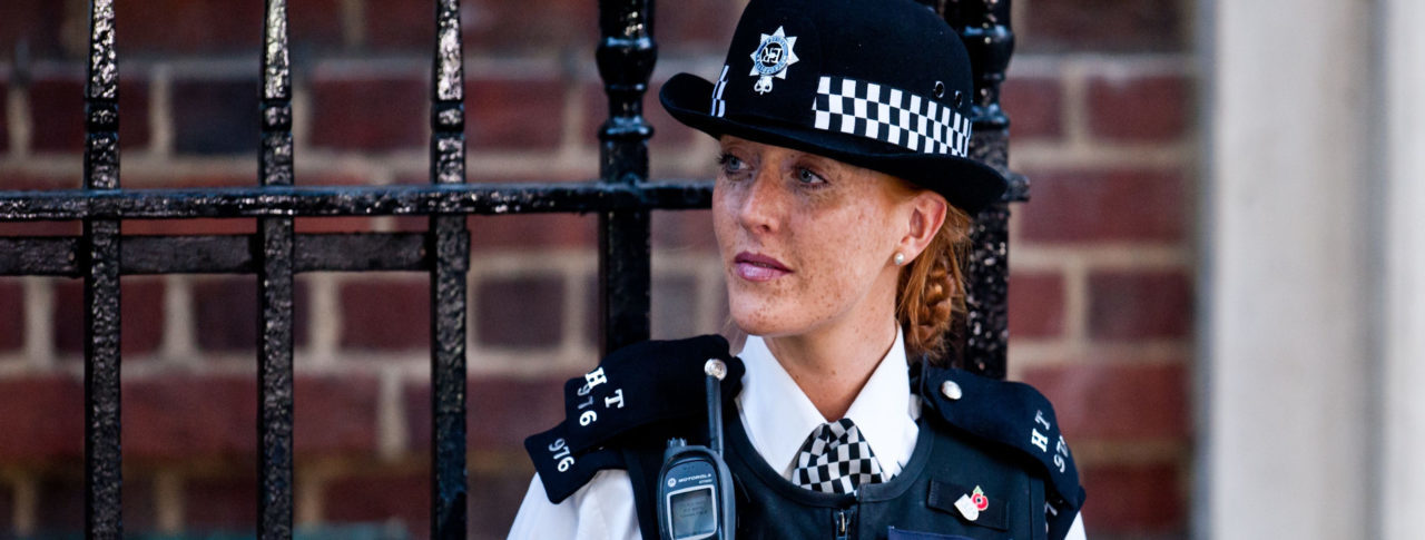A Police Officer stood outside a gate who can now be identified using the new Visual Impairment Procedure