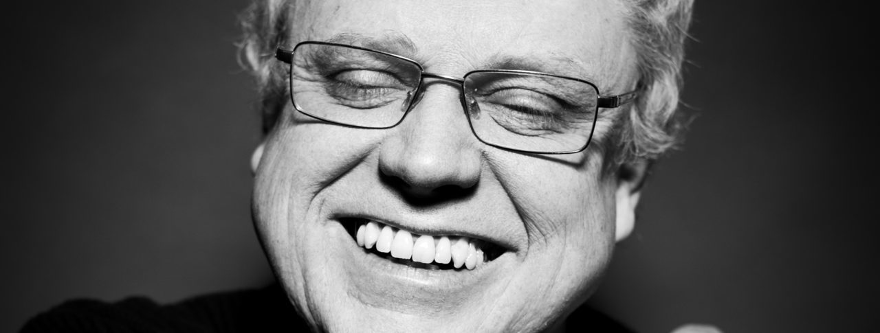 Black and white photo of John Morris who is the author of the poem 'Not going out'