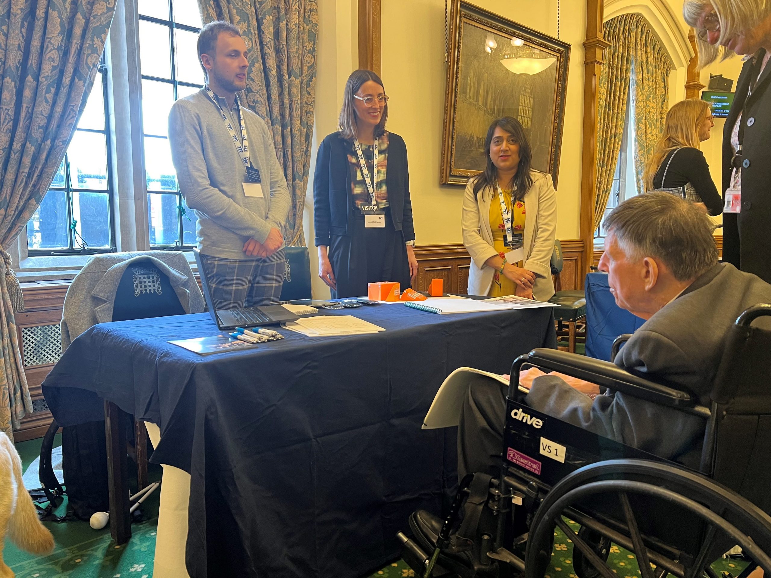 Lord Low, pictured talking to members of the education team.