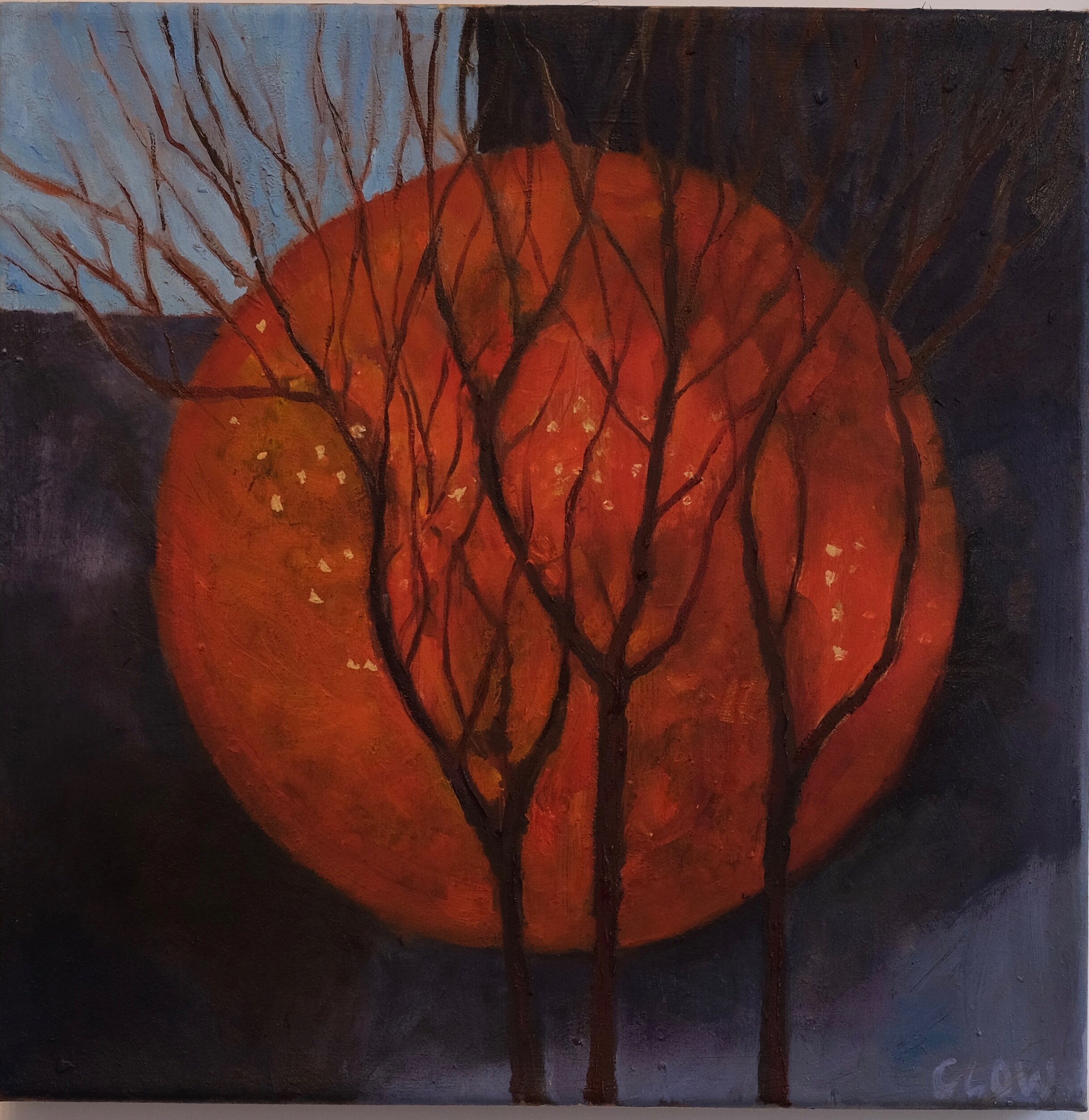 The picture depicts a painting that shows a large, bright orange circle with white dots scattered across its surface. The circle is surrounded by several dark, leafless tree branches that are positioned around the circle. The background is dark blue, with a hint of blue sky visible on the left side. The orange circle and trees combined look like blood vessels at the back of the eye or retina. 