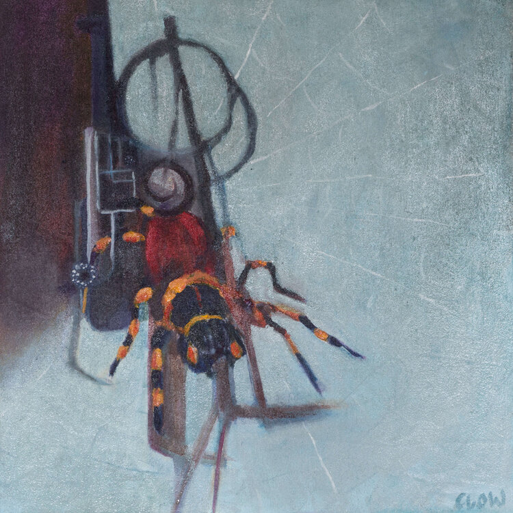 The image depicts a painting of a tarantula spider climbing over the barrel of a gun, surrounded by other metal items hanging in a bunch. The spider is hanging upside down, suspended by a single thread of silk. The background is a textured, light-blue colour, suggesting a web near a wall. The spider is predominantly red and black, with orange and yellow markings on its legs. The painting captures the spider's intricate details, including its eight legs and large, round abdomen. The overall composition is balanced, with the spider centred in the frame and the thread of silk leading the viewer's eye upward. The painting conveys a sense of stillness and quiet, despite the contradiction with the gun barrel, other metal items and cool blue background.  