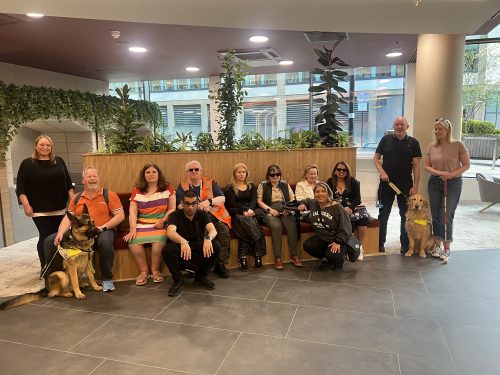 Group photo of Birmingham and Black Country SLC members in doors.