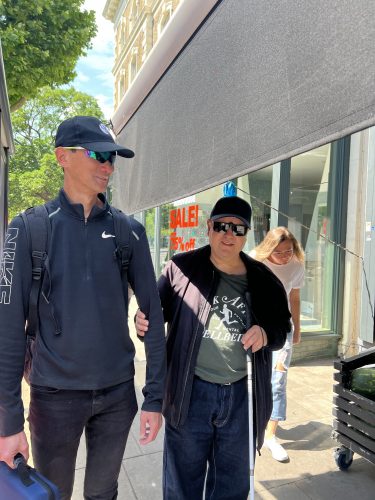 North London SLC members Paul & Emmanuel on the Sim-Spec walk. Paul is on the left and supporting Emmanuel who is holding a white-cane and wearing Sim-Specs.