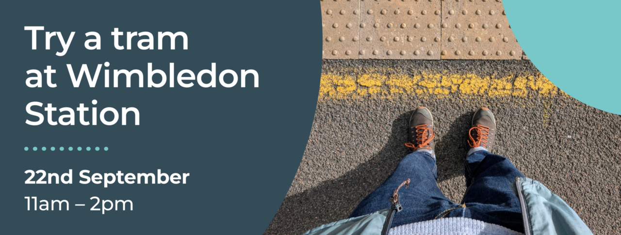 Promotional graphic for a "Try a tram at Wimbledon Station" event. The graphic displays the date, 22 September, and time, 11am–2pm, in white writing against a dark teal background, alongside a top-down photograph of a person standing behind a yellow safety line next to tactile paving on a station platform.
