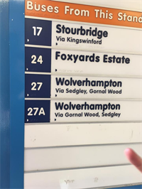Old bus timetable with blue and orange text