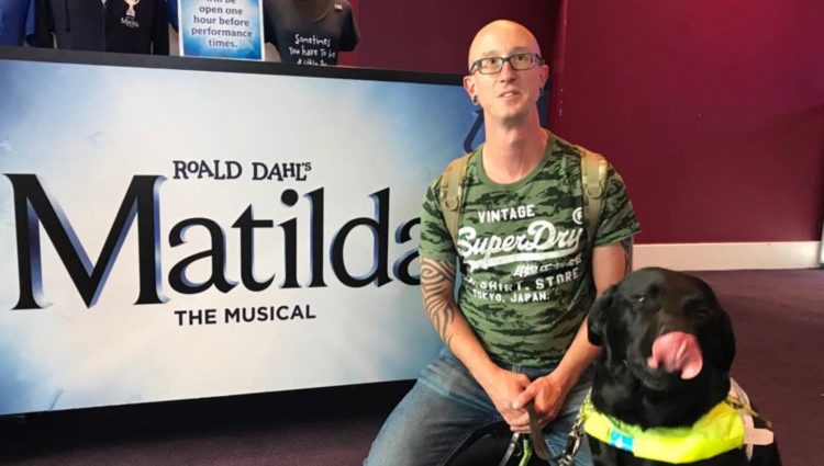 Image showing man at the Birmingham Hippodrome with his guide dog