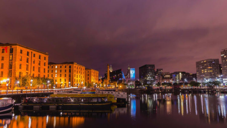 Image showing a nighttime scene in a city with views over the canal