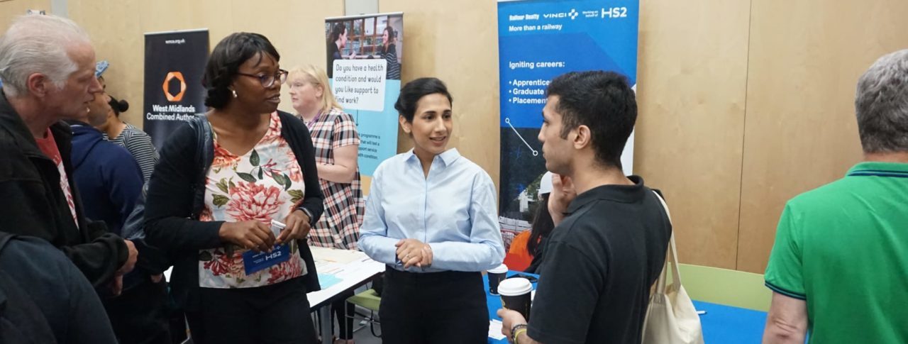 Image showing delegates talking at the Pan-Disability Jobs Fair