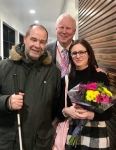 Image of Merseyside volunteers Mick Spriggs and Laura Kennedy standing either side of North West Engagement Manager Iain Mitchell.