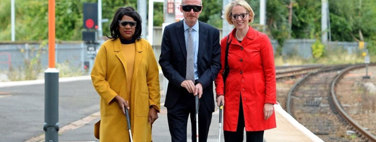 Image showing 3 people with walking sticks on the platform at Wolverhampton Train Station