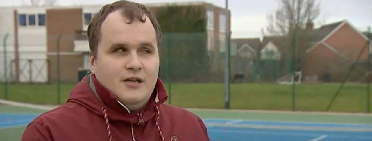 Hubert talking to BBC on a Tennis Court