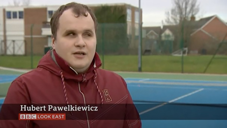 Hubert talking to BBC on a Tennis Court