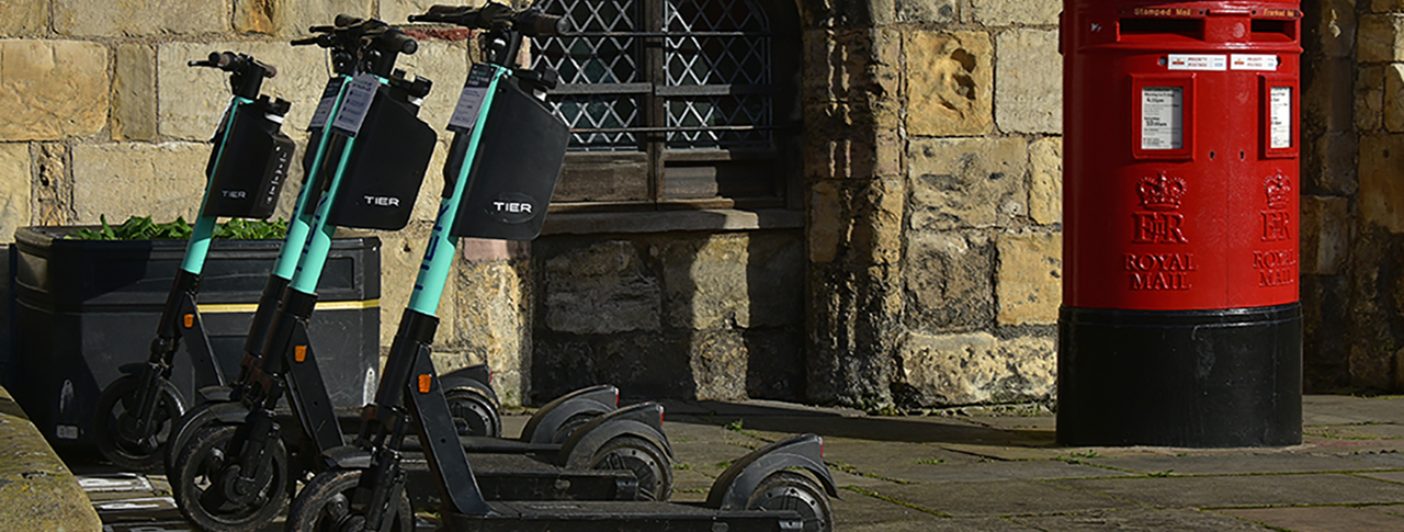 e-scooters parked on a street in York