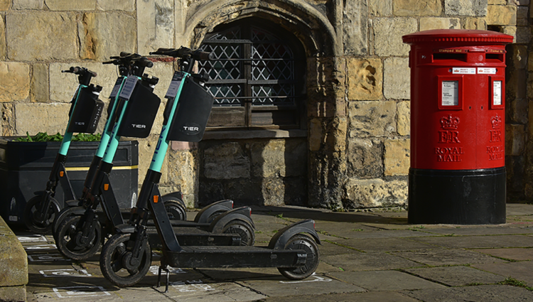 e-scooters parked on a street in York