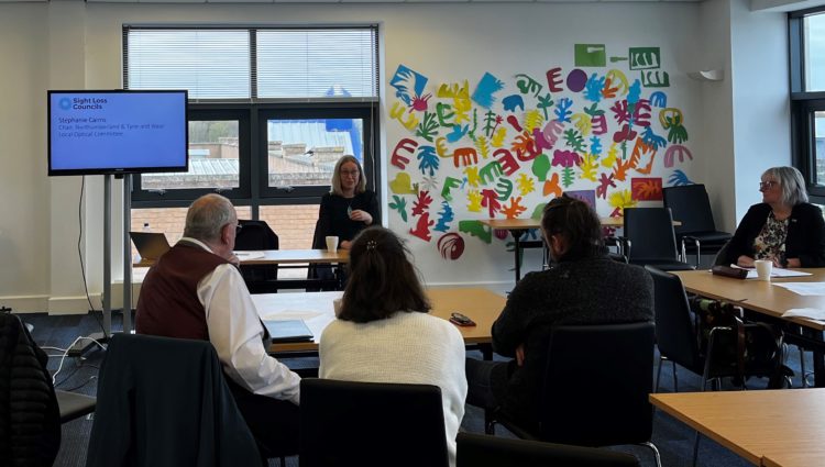 group of people gathered in a class room