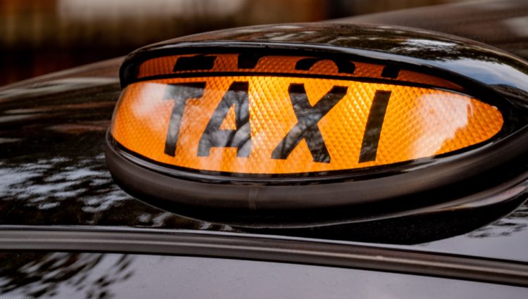 A taxi with the light on