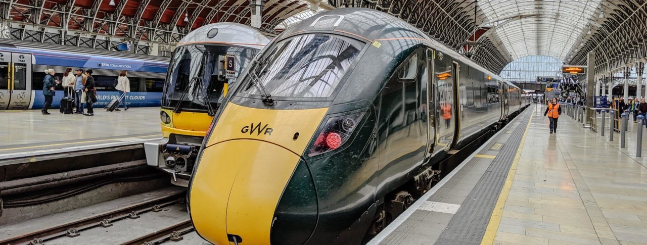 A Great Western Rail Azuma train idles at a station platform at King's Cross