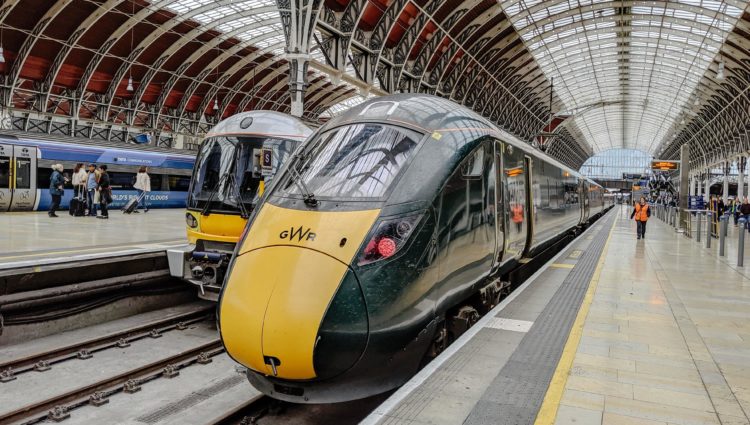 A Great Western Rail Azuma train idles at a station platform at King's Cross