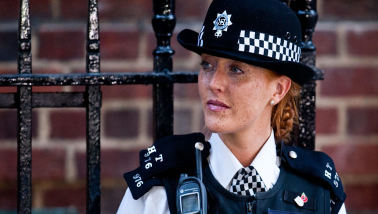 A Police Officer stood outside a gate who can now be identified using the new Visual Impairment Procedure