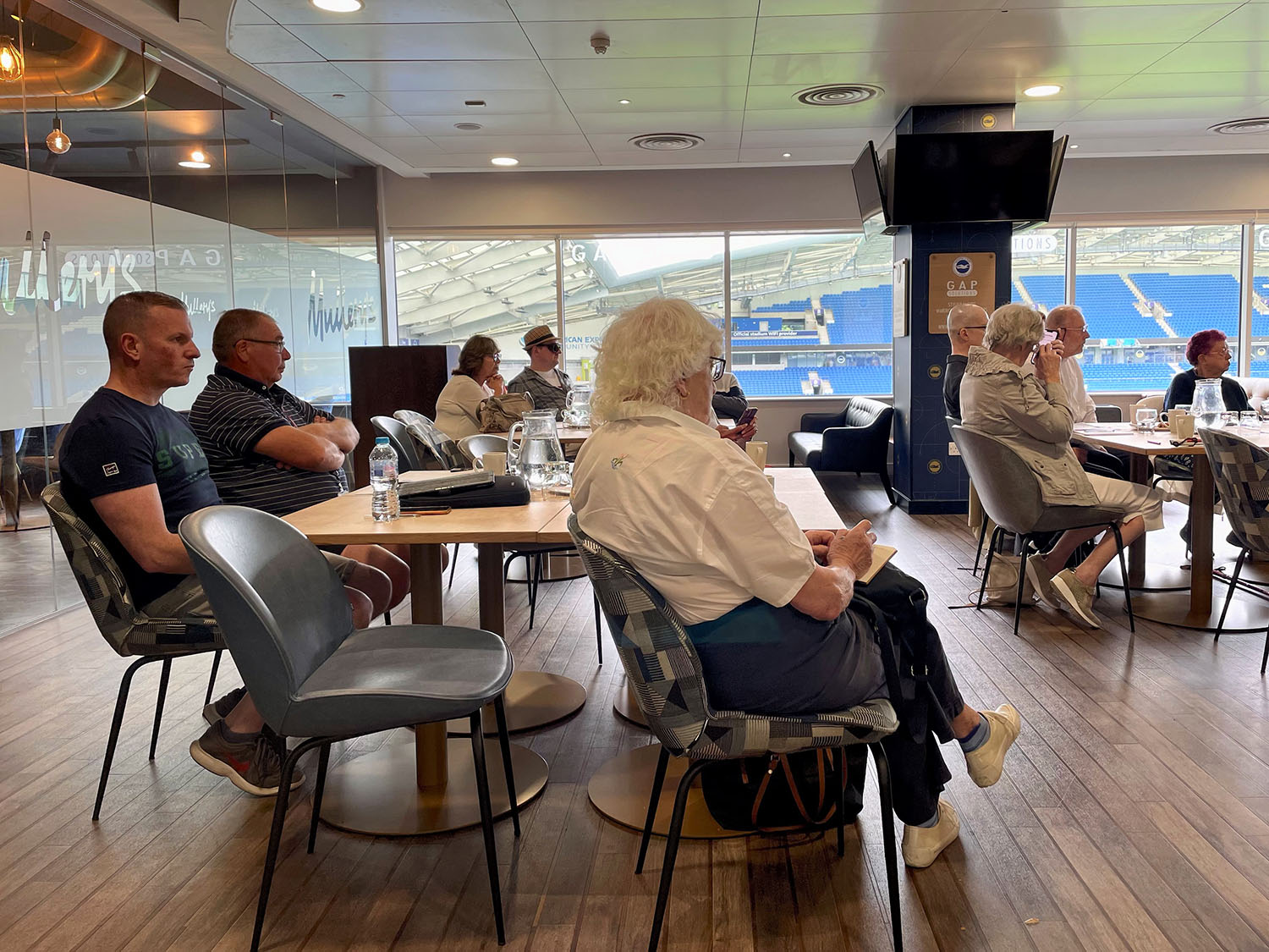 Audience members sat listening to one of the guest speakers at the Make Transport Accessible forum. 