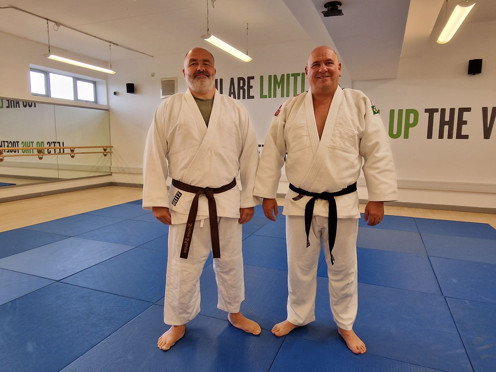 Sight Loss Council member Simon Sharpe (left) with Ian Sidaway, Head Coach and Knottingley Judo Club (right), stood side-by-side before starting a judo session.