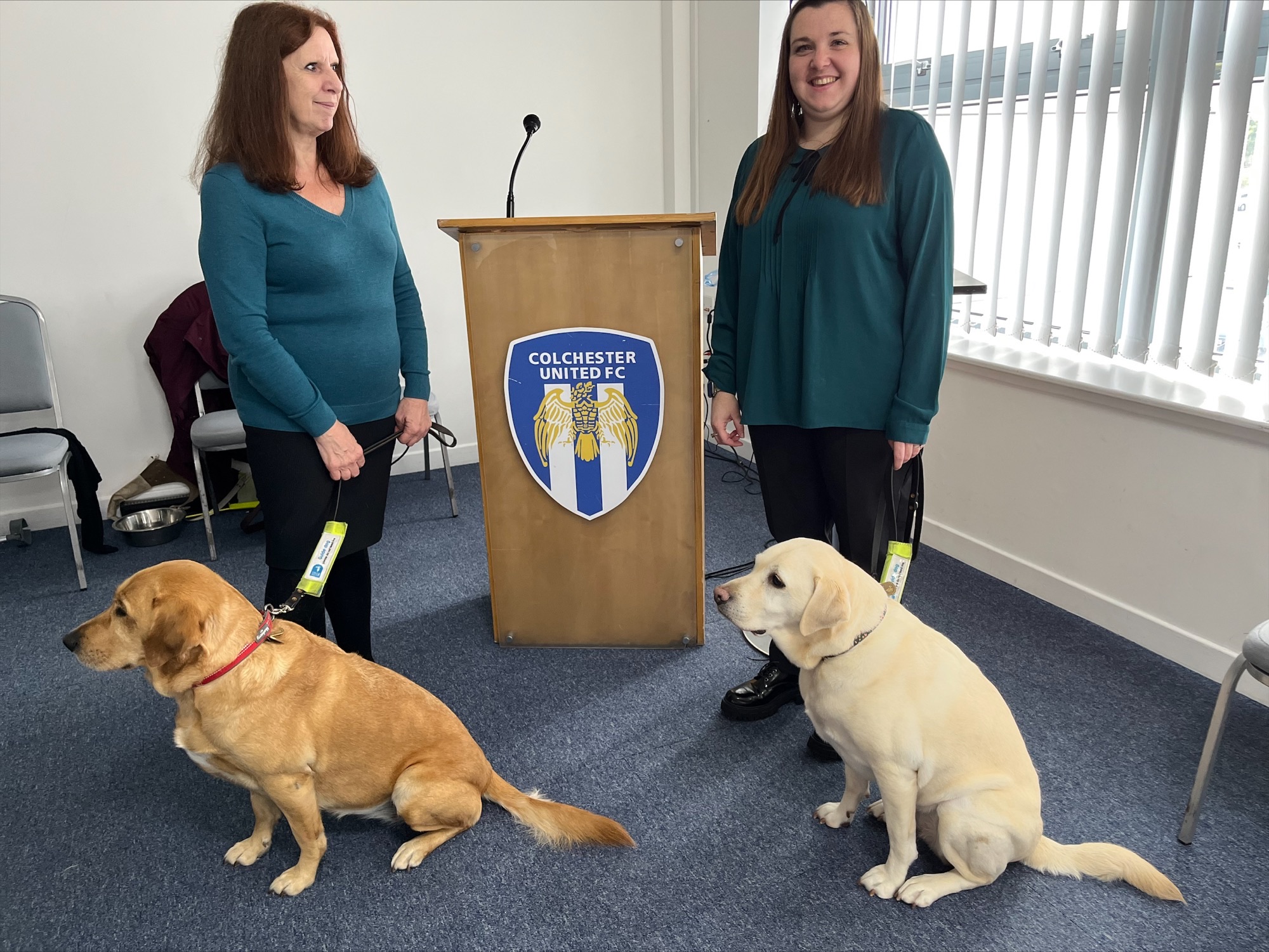 Annette Bodsworth, Essex SLC member, with Sam Leftwich, Essex SLC Engagement Manager with their guide dogs