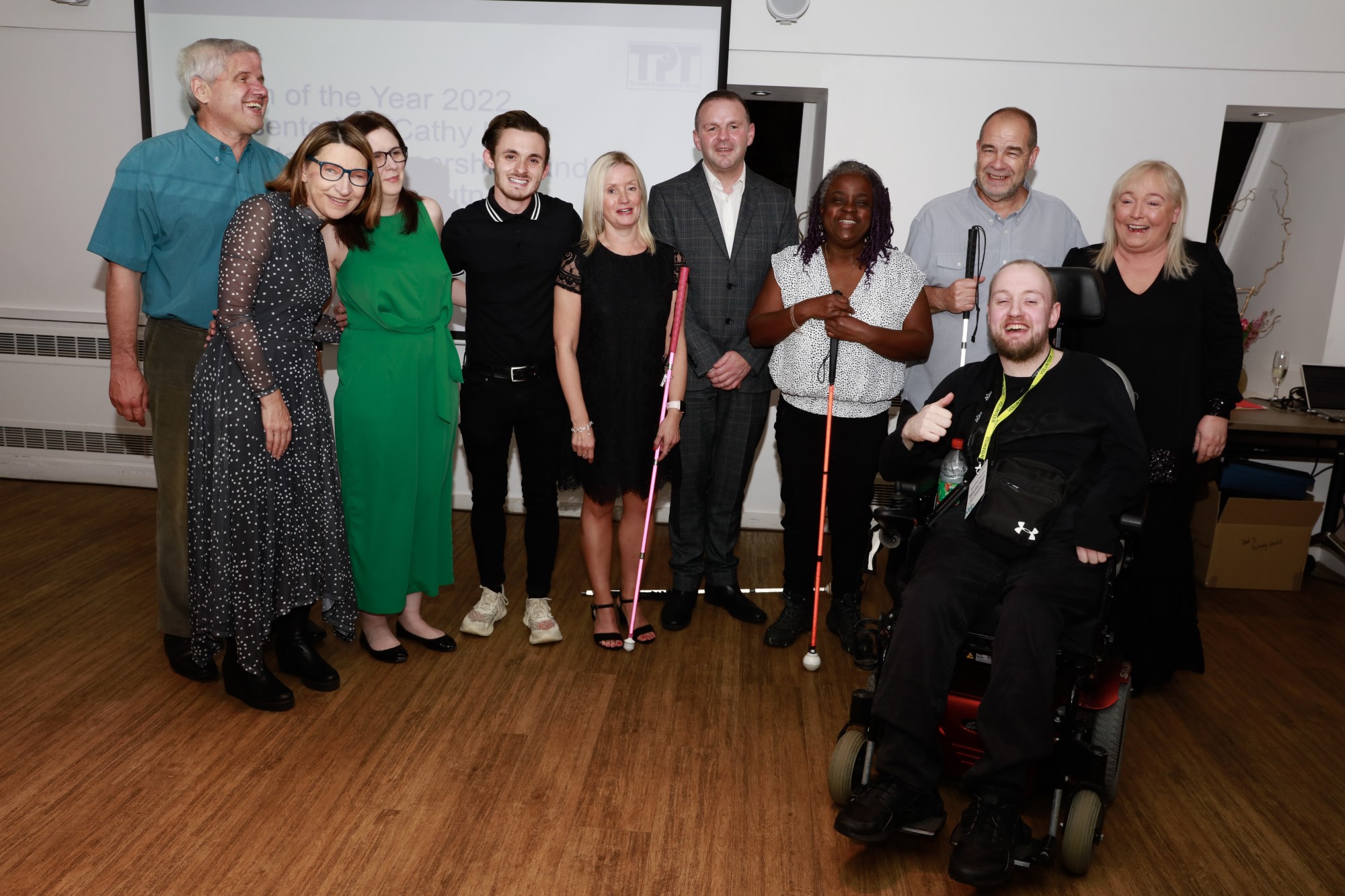 Merseyside Sight Loss Council members collecting their Team of the Year award at this year's Sight Loss Council conference