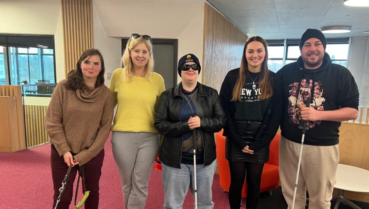 Worcester SLC launch meeting. From left to right: Laura Tambin and guide dog Rose, Engagement manager Louise Connop, Millie Hayter, SLC coordinator Ashleigh Bryant, and SLC member, Edward Jackson.