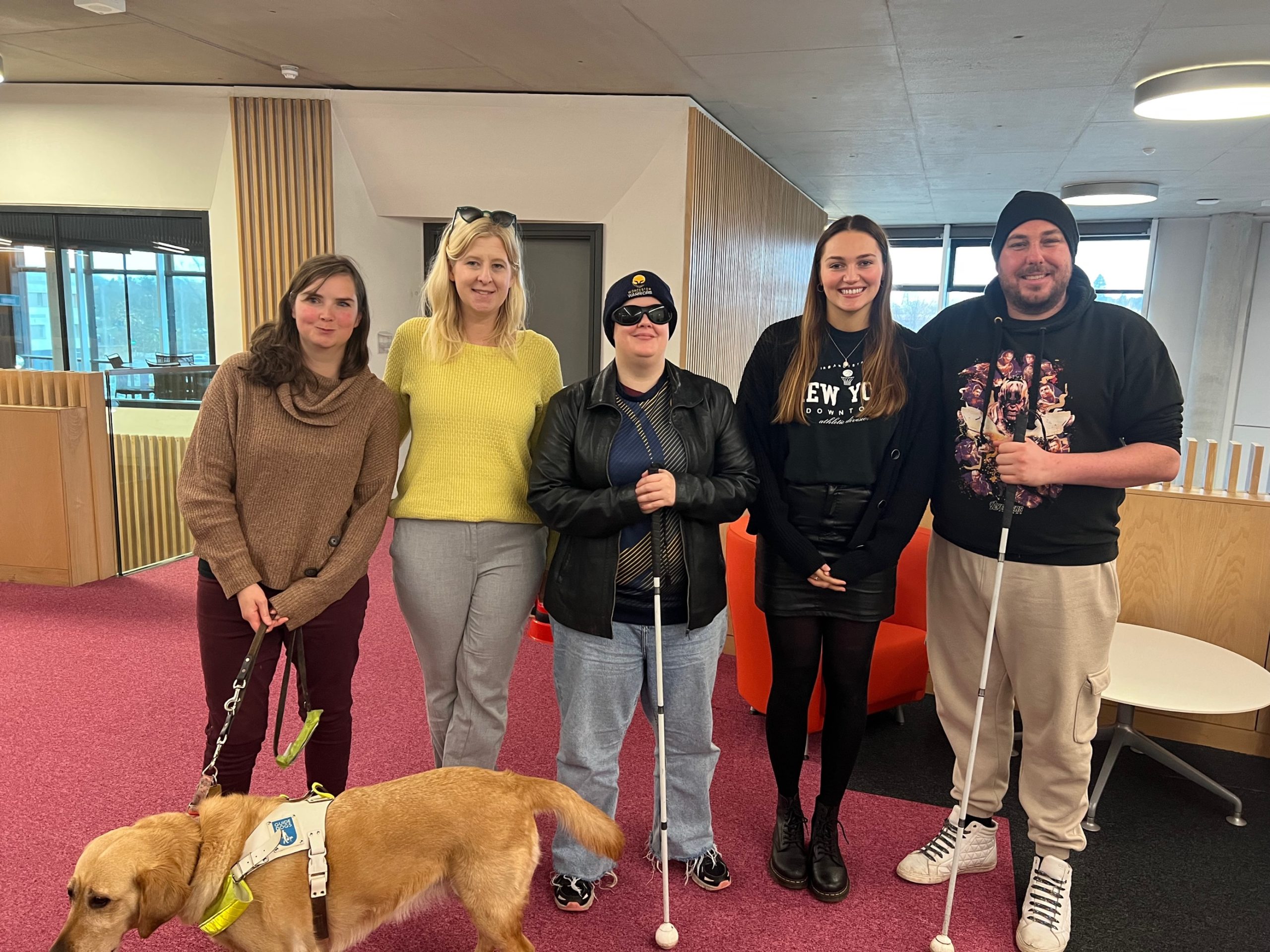 Worcester SLC launch meeting. From left to right: Laura Tambin and guide dog Rose, Engagement manager Louise Connop, Millie Hayter, SLC coordinator Ashleigh Bryant, and SLC member, Edward Jackson.