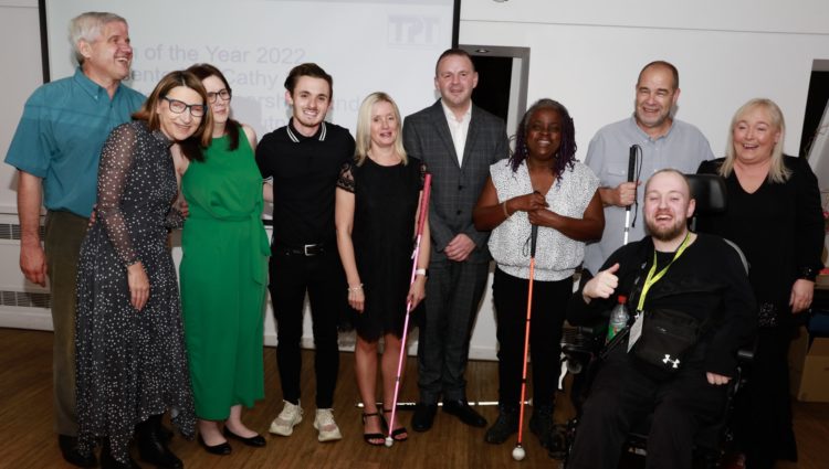 Merseyside Sight Loss Council members collecting their Team of the Year award at this year's Sight Loss Council conference