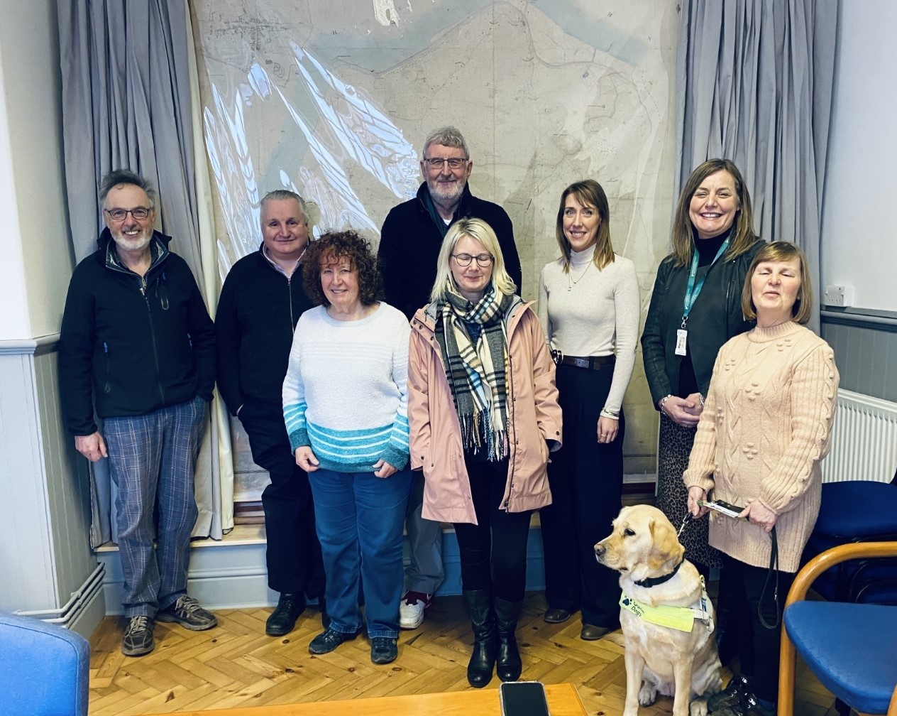 From left to right: Gordon Craig, Berkeley Ward Councillor, Alun Davies, EM for Gloucestershire SLC, Liz Ashton, Berkeley Town Councillor, Paul Turner, Berkeley Town Councillor, Justine Hopkins, Berkeley Town Clerk, Hannah Emery, SDC Corporate Policy and Governance Manager, Liz Shellam, SDC Community Access and Engagement Manager, and Julie Stephens, SLC member, and guide dog Heidi.