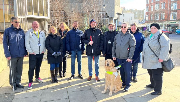 Group shot of those attending the sim spec walk. Engagement manager Dave Smith, is with SLC members Iris and Graham, and members of the Highways Transport team at Brighton and Hove City Council.