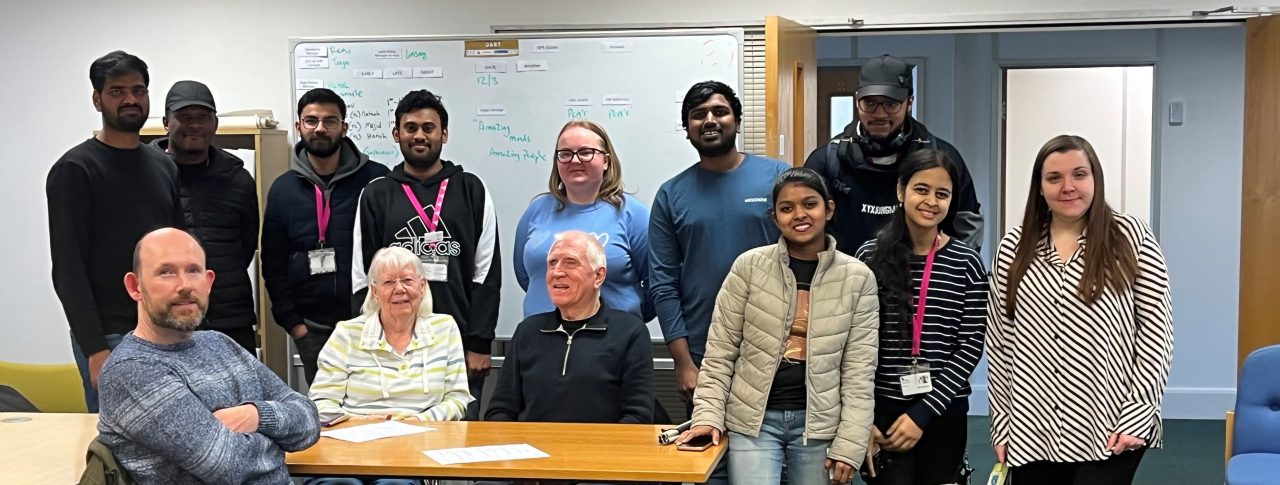 Bedfordshire SLC Engagement Manager, Samantha, and guide dog Lizzie, pictured with SLC members Stefan, and Phil, and Ethos Farm Staff. They are stood in a group, smiling at the camera.