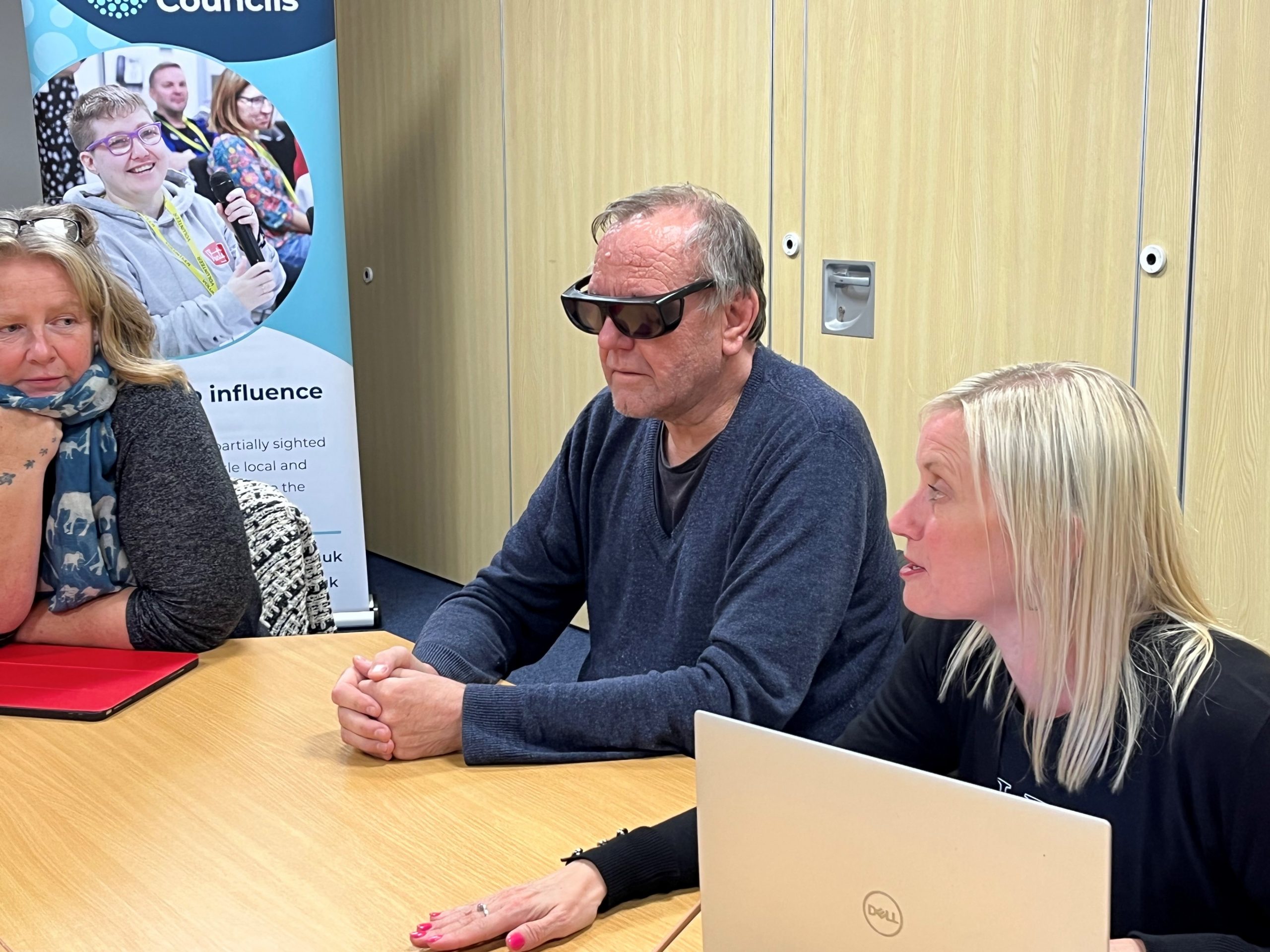 Kelly talking to Michael and Alison, during their launch meeting.