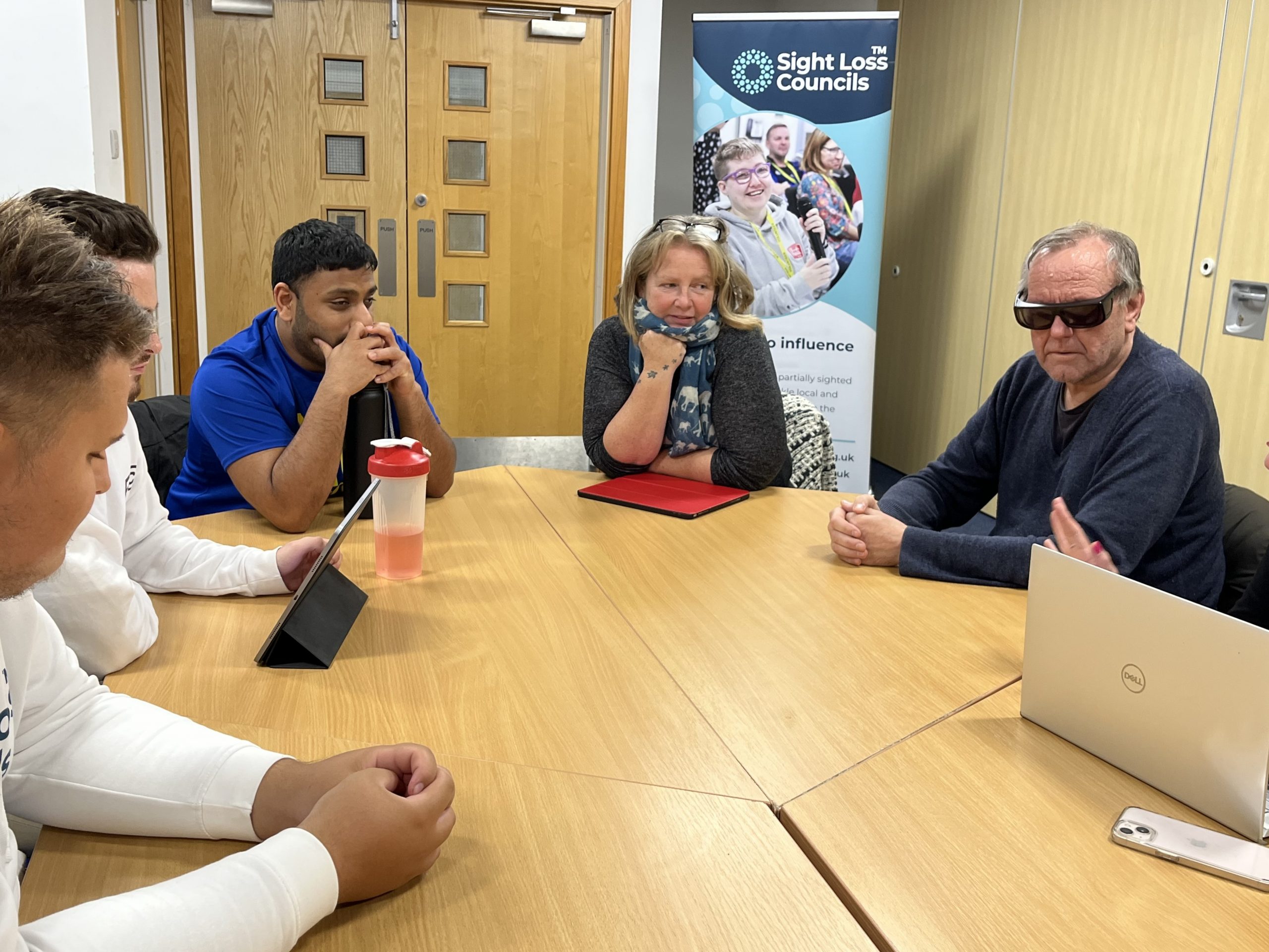 Lancashire SLC members talking during their launch meeting. From left to right: Lloyd, David, Mohammed Salim, Alison, and Michael.