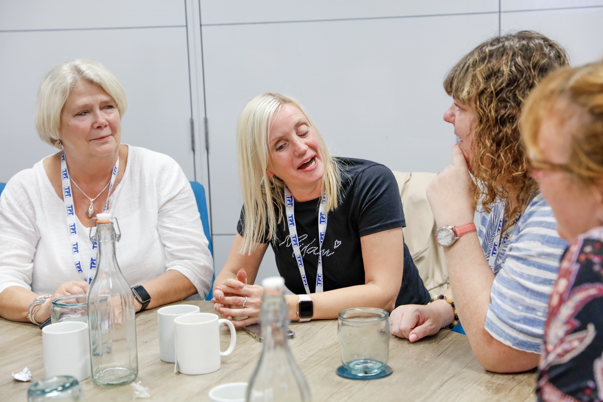 Gill Currie, Kelly Barton, Rachael Foley, photographed laughing together during the retail project session.