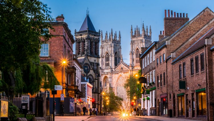 York Sight Loss Council image showing city streets at dusk with York Minster in the background