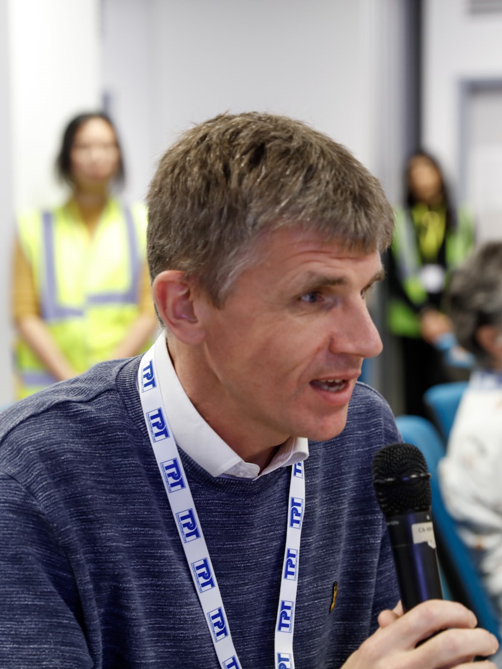 Dave Smith, Engagement Manager for South East England, pictured at the 2023 SLC Conference. Dave is speaking into a microphone.