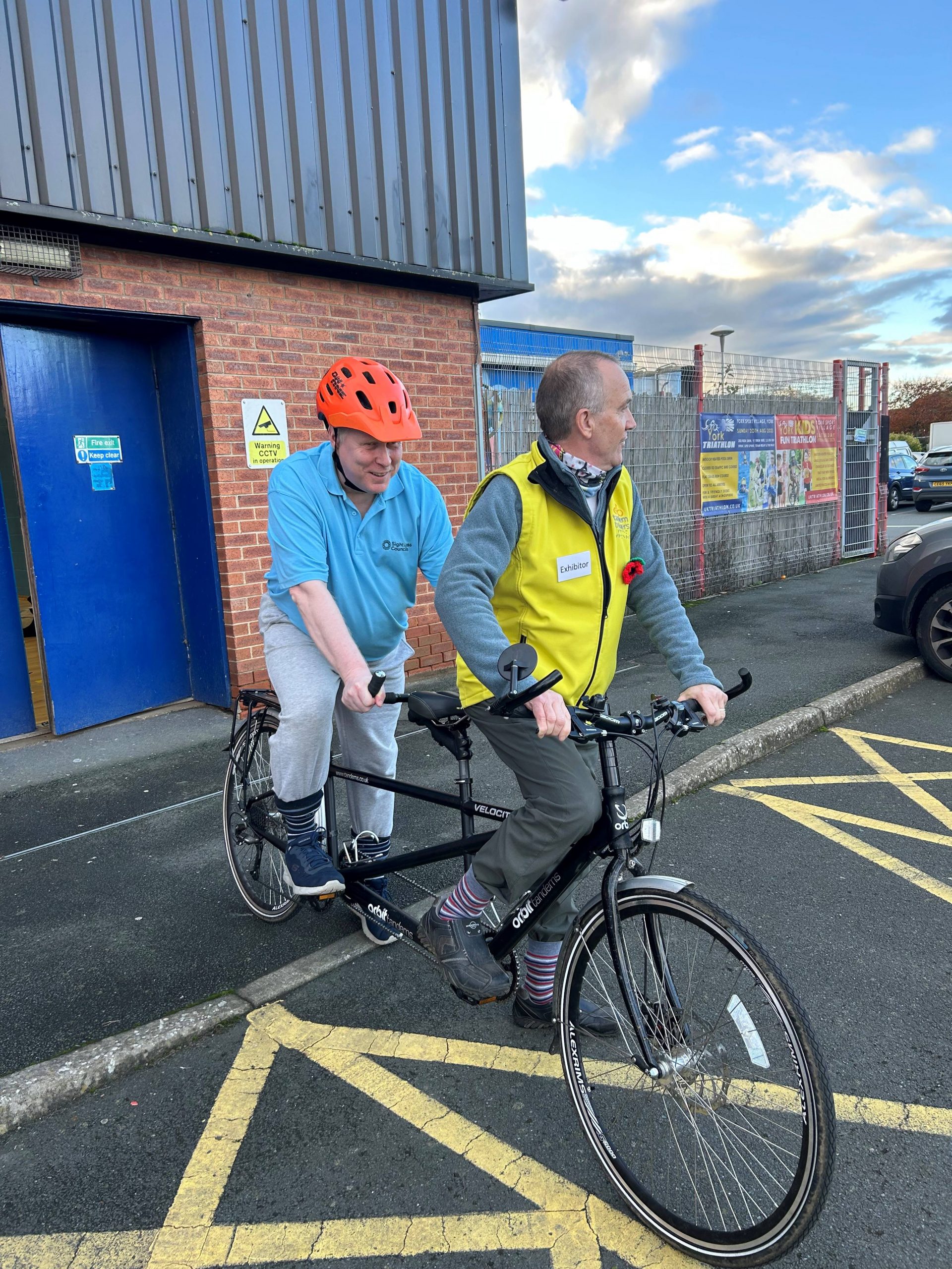 Senior Engagement Manager, Iain Mitchell, riding the tandem bike with Tandem Trekkers.