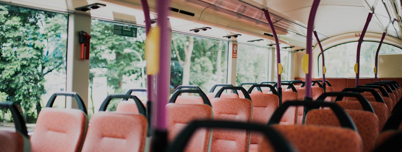 The empty upper deck of a bus