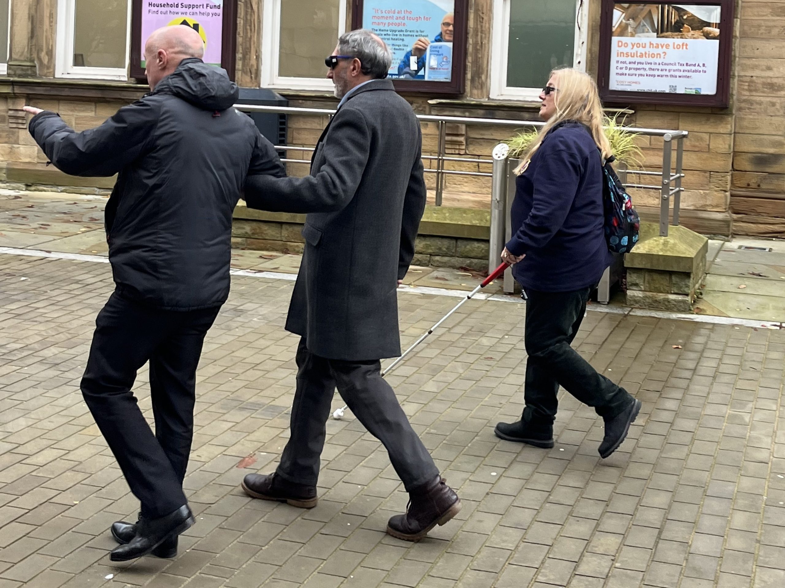 Lancashire SLC member Dawn, walking alongside two councillors during the sim spec walk in Pendle.