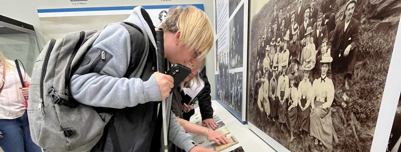 Greater Manchester Sight Loss Council member Anthony Cough pictured feeling tactile exhibitions at Orsdall Hall.